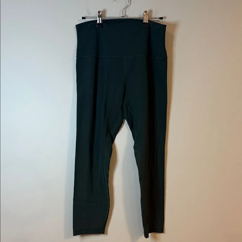 Lululemon dark green smooth leggings in size‎ 10 23” inseam